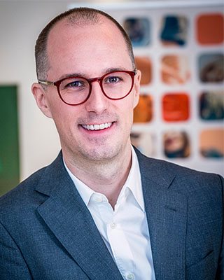 Porträttbild på Philip Scholtzé